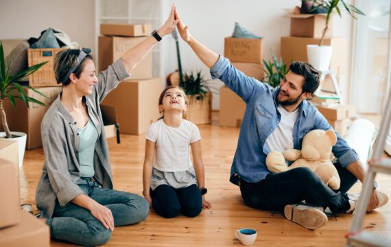 happy family with too many boxes